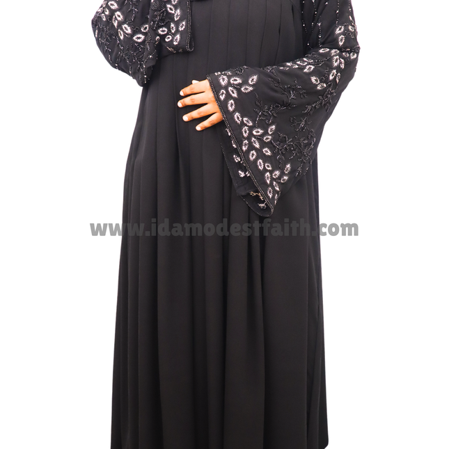 Black Fancy Peacock Feather Embroidered Abaya, designed for those who love unique craftsmanship and luxurious style. Crafted from imported Korean Nida fabric and chiffon