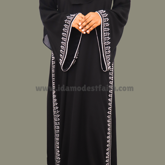 Umbrella Sleeves for a Royal Look dazzling crystal stones and cutdhana embellishments Made with premium imported Korean Nida fabric Abaya